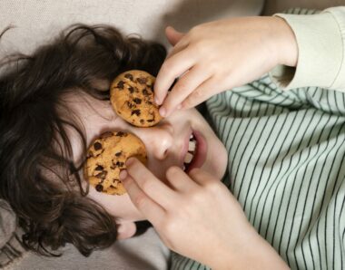 kid-eating-cookies-at-home_Freepik