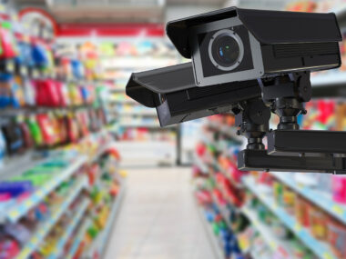 cctv camera or security camera on retail shop blurred background