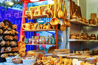 Wooden kitchen accessories displayed for sale at Riga Christmas market